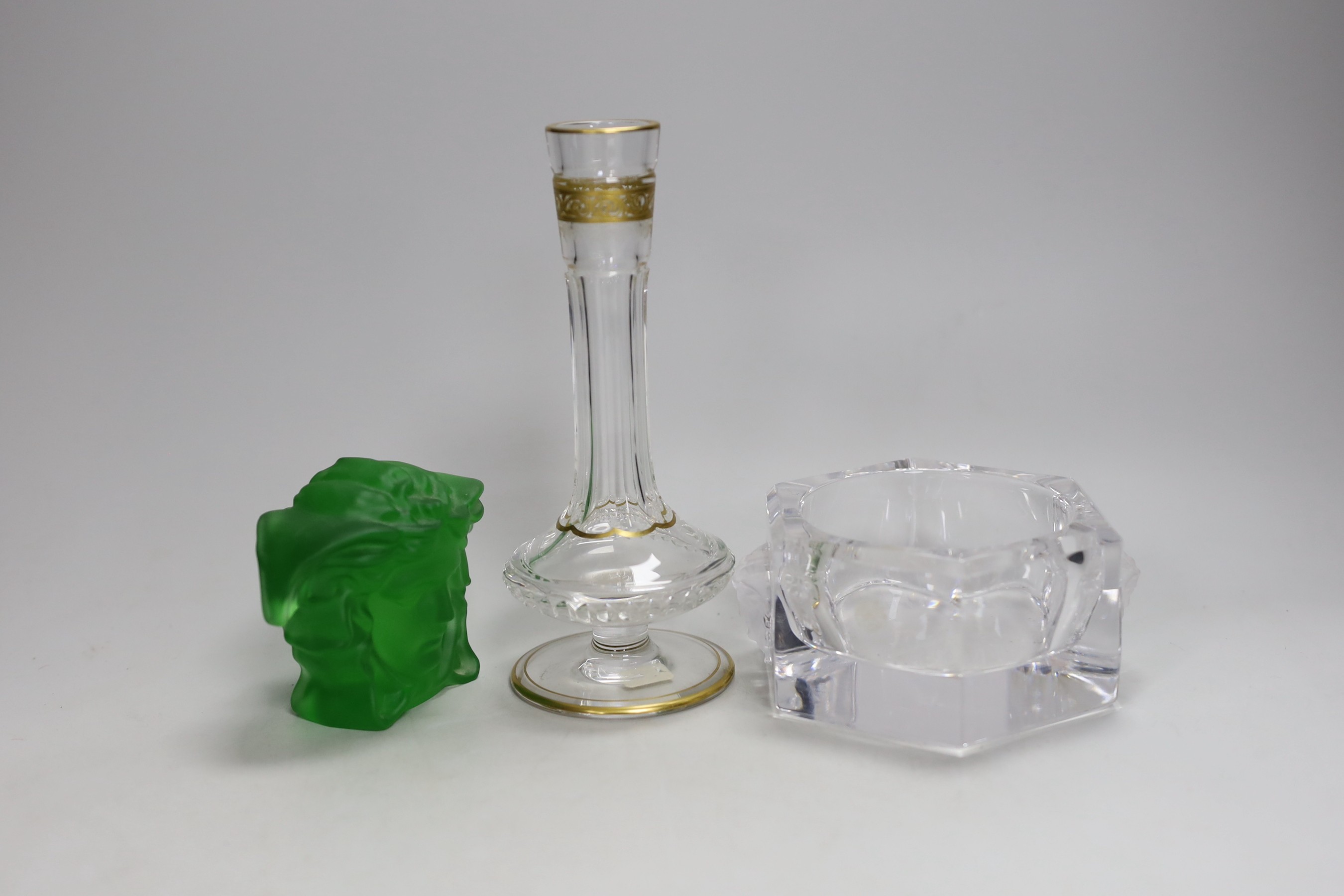 A Versace pressed green glass Medusa paperweight, a Versace ashtray and Asprey Saint Louis scent bottle